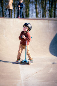 Boy on scooter @ skatepark