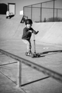 Boy stepping at skatepark