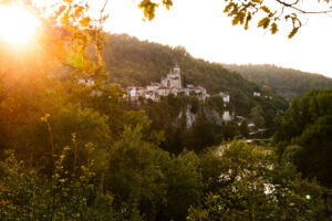 Old town near river in France, with sunsetting