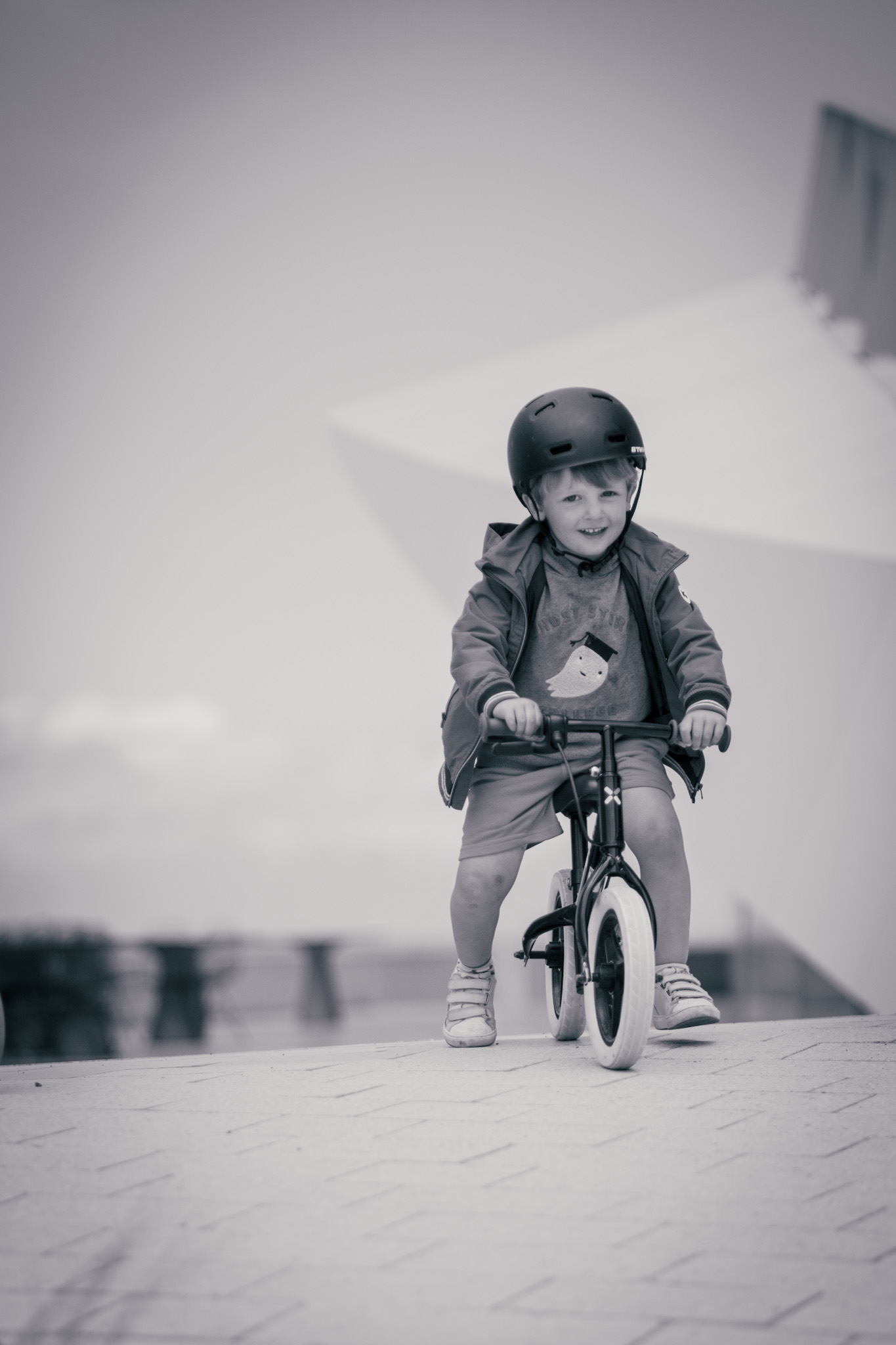 Boy on bike at beach